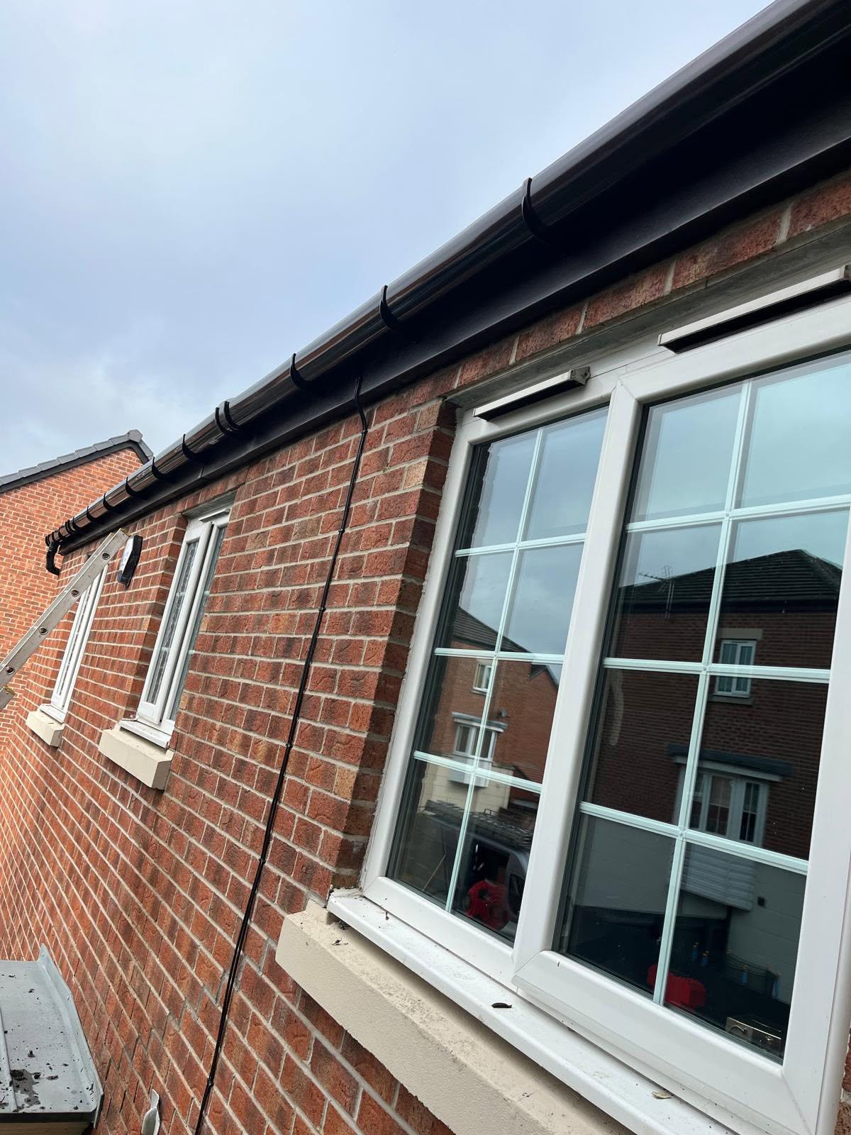 Clean white UPVC fascia, soffit and guttering